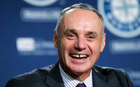 Rob Manfred laughing at how much he hates baseball.