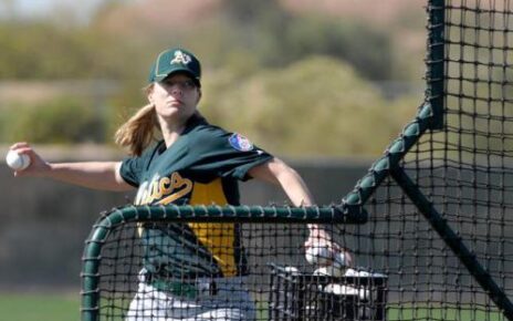 Justine Siegal throws BP for the Oakland Athletics.