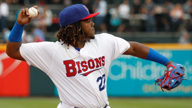 Vladimir Guerrero Jr. throwing a ball while with the Buffalo Bisons.