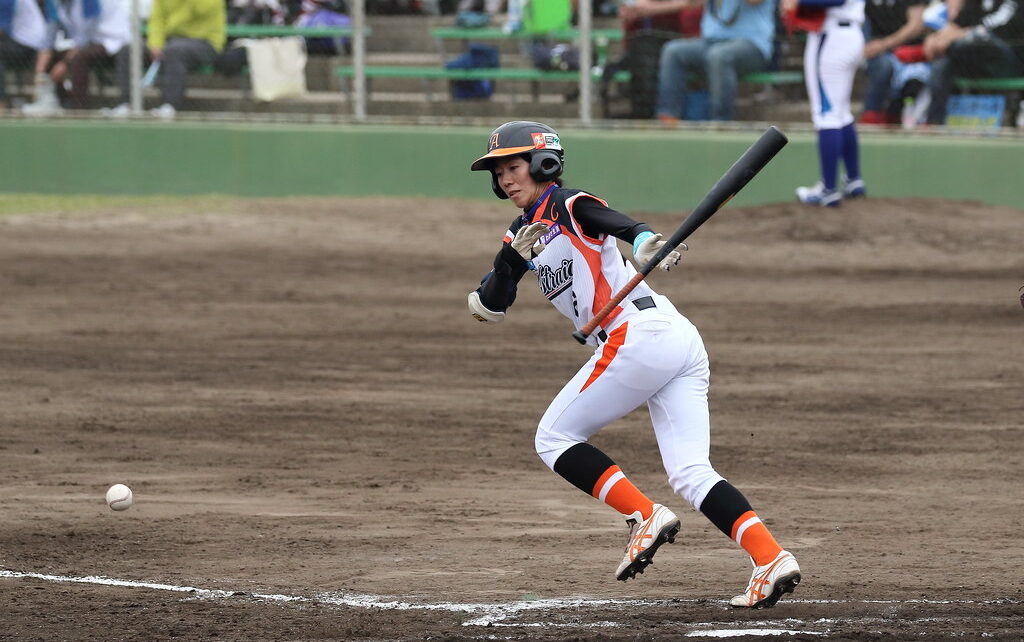 A player running out of the batter's box in a Japan Women's Baseball League game.