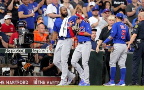 Albert Almora Jr. consoled by teammates after he struck a fan with a batted ball in Houston.