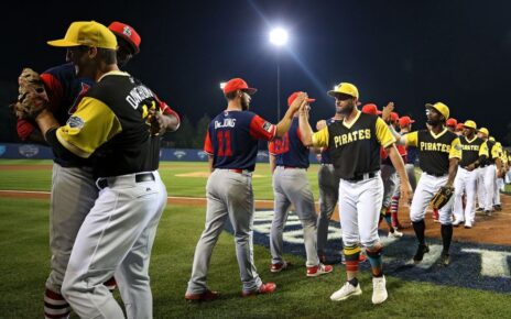 Pirates and Cardinals shaking hands after the 2017 Little League Classic