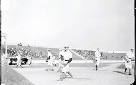 Bob Wicker warming up before a game in 1903.
