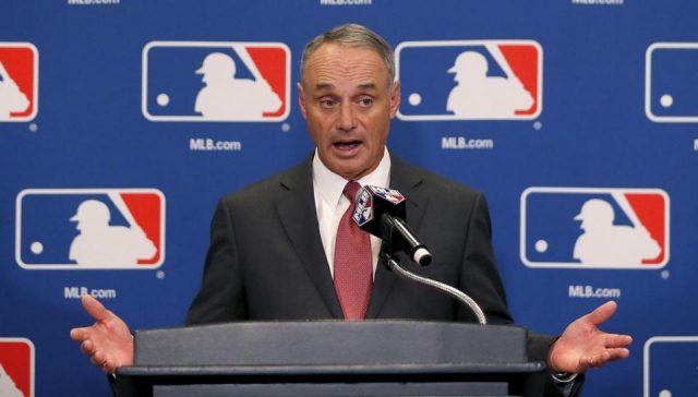 Rob Manfred telling reporters how much he hates baseball.